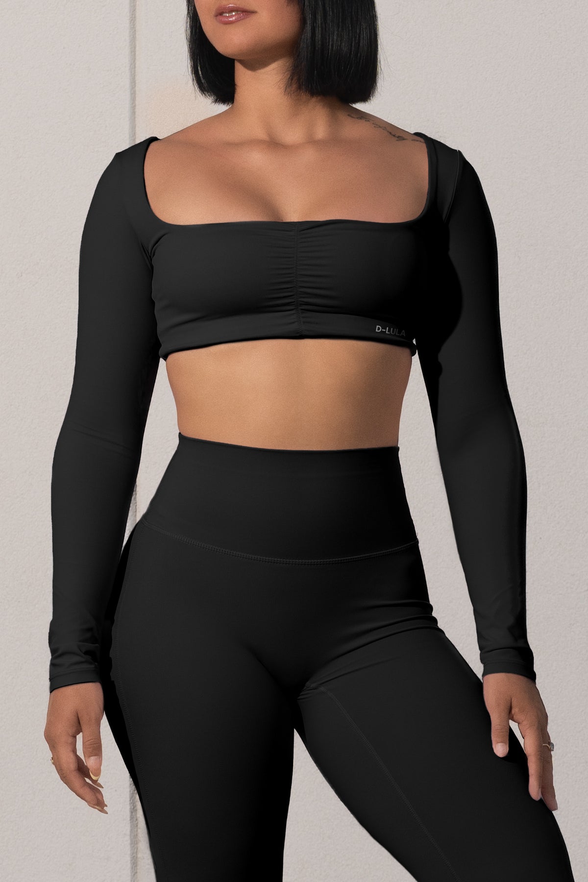 LUXE MOTION LS CROP TOP in black