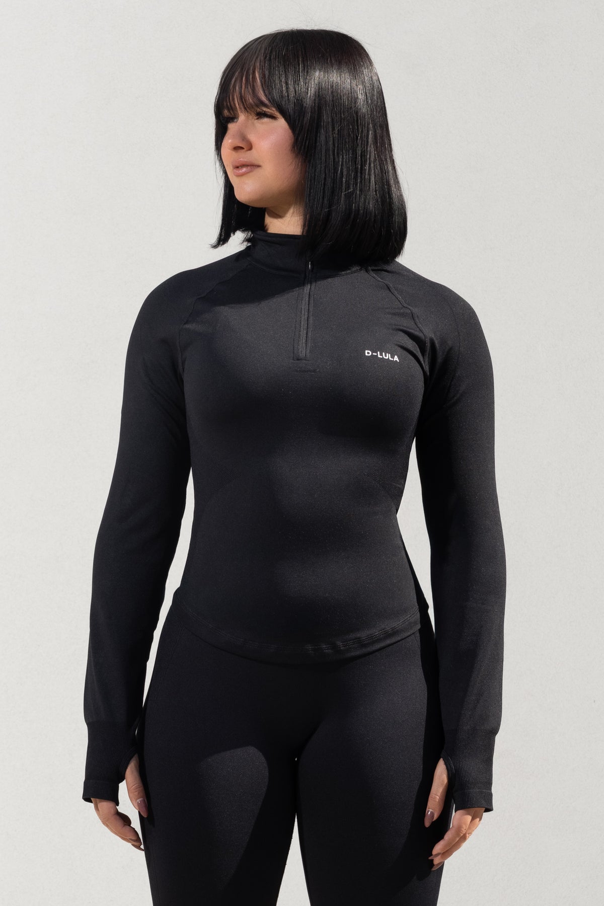 SHAPE HALF ZIP-UP in black